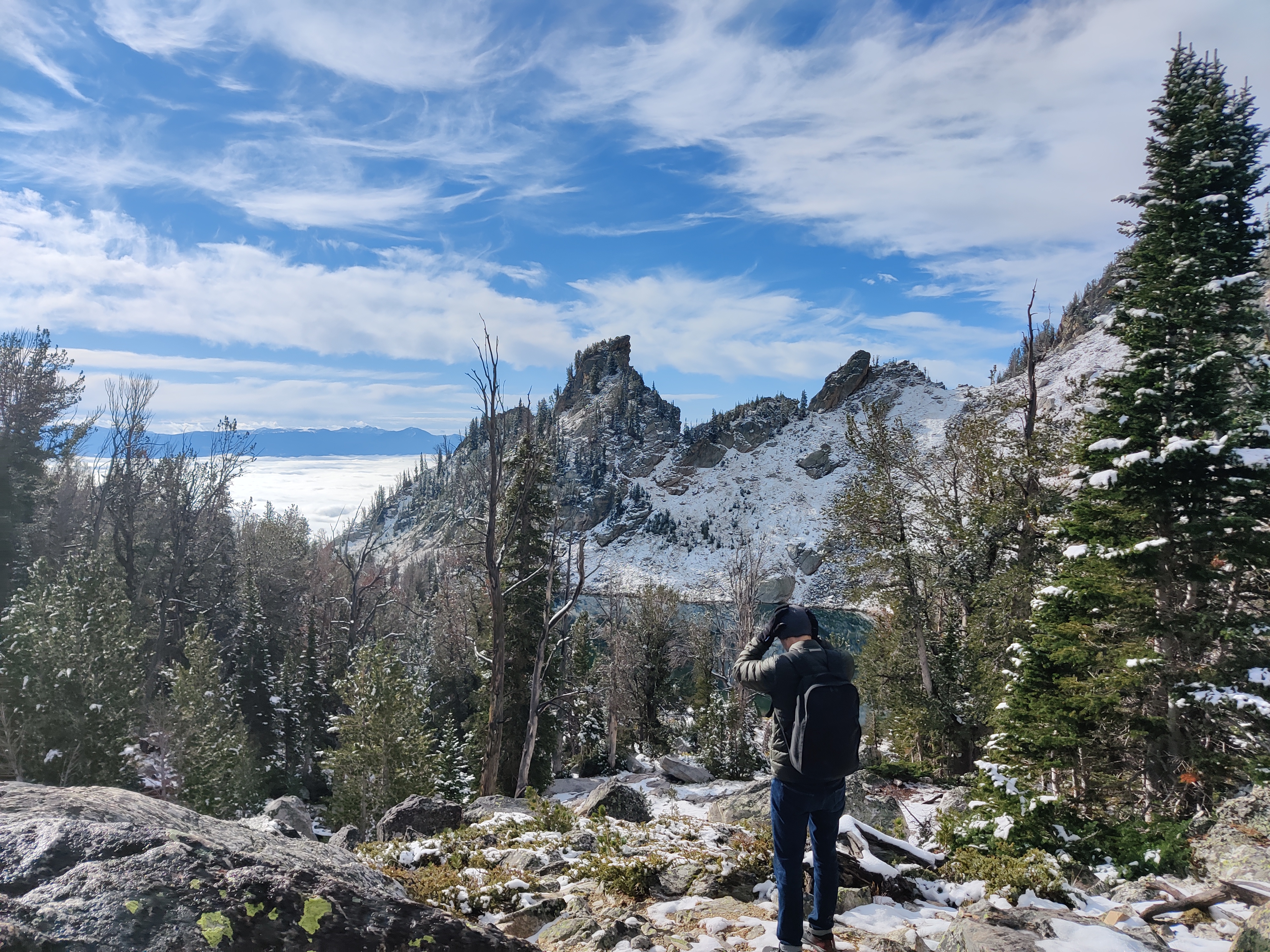 Scenic mountain view with photographer